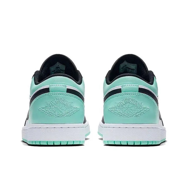 Air Jordan 1 sneakers with teal heel panel, black collar, white midsole