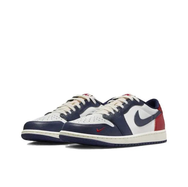 Jordan 1 low-top sneakers, navy and white uppers with red heel panel