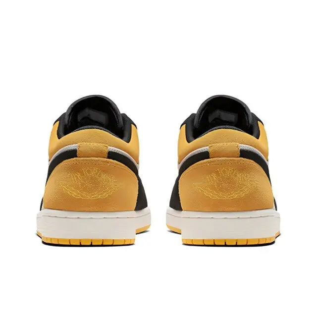 Air Jordan 1 heel view with black collar, gold overlays, and white midsole