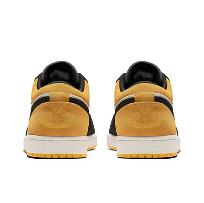 Air Jordan 1 heel view with black collar, gold overlays, and white midsole