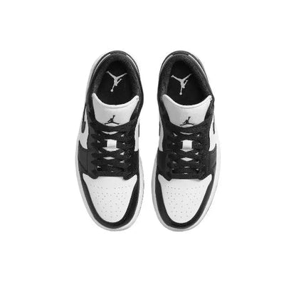 Air Jordan 1 low-top sneaker pair, white toe box with black laces and lining
