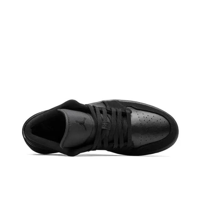 Air Jordan 1 low-top sneaker side view with black laces and padded collar