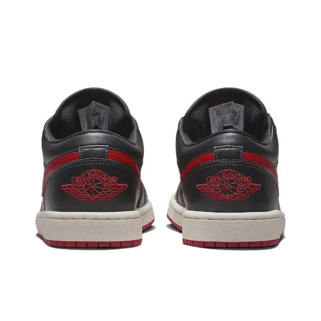 Air Jordan 1 heel sneakers in black with red side wings and white midsole
