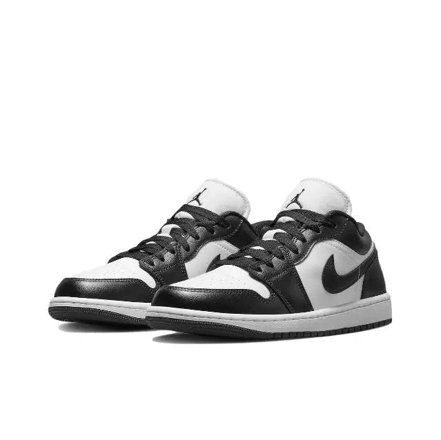 Air Jordan 1 low-top sneaker, black and white panels with Nike swoosh