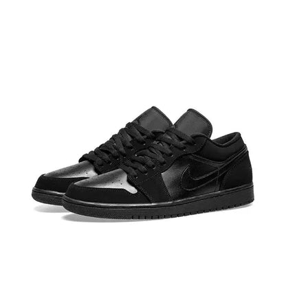 Air Jordan 1 low-top sneaker with stitched overlays and side Swoosh in black