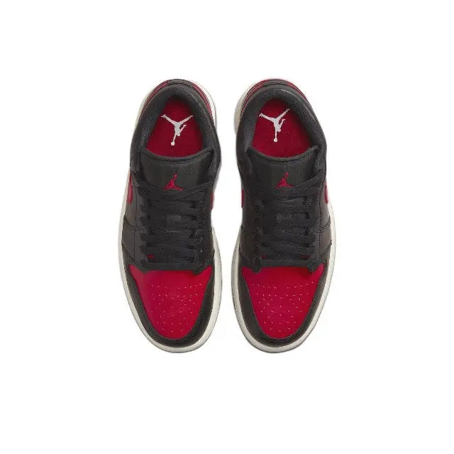 Air Jordan 1 low-top sneakers, black with red toe panels and Jumpman on tongue