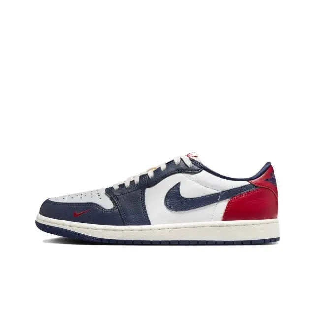 Jordan 1 side view with navy leather, white panels, and red toe cap