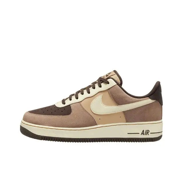 Nike Air Force 1 low-top sneaker, tan suede upper with cream swoosh and brown accents