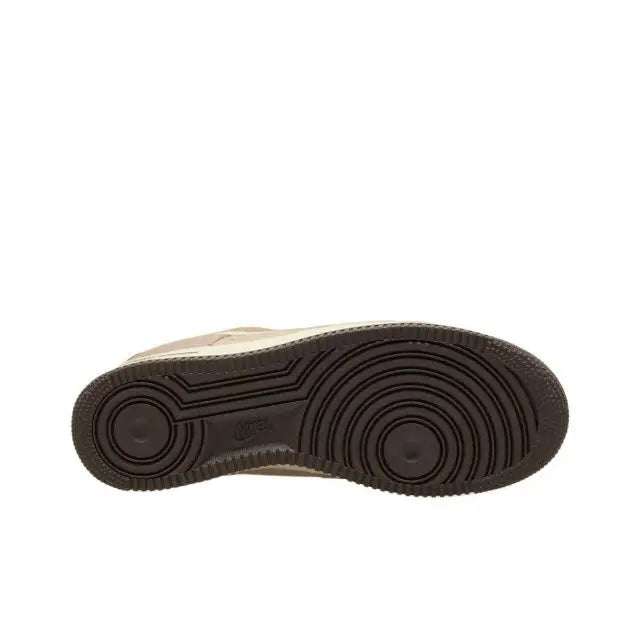 Nike Air Force 1 low-top sneaker outsole, dark rubber tread with circular patterning