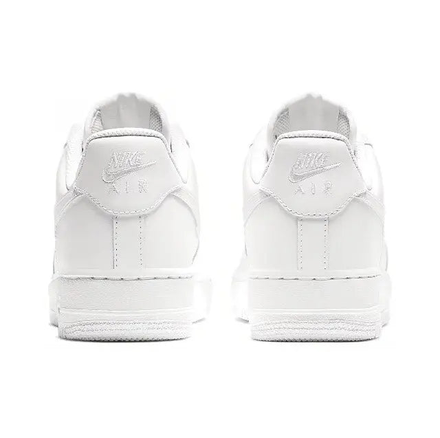 White Nike Air Force 1 low sneaker, heel and back view with lace-up and swoosh