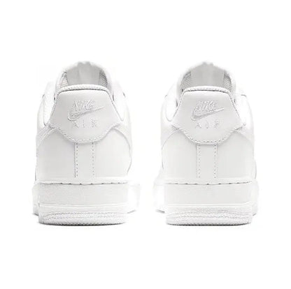 White Nike Air Force 1 low sneaker, heel and back view with lace-up and swoosh