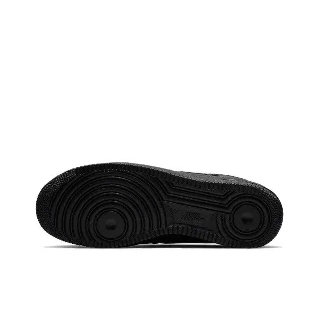 Black sneaker outsole with circular tread pattern