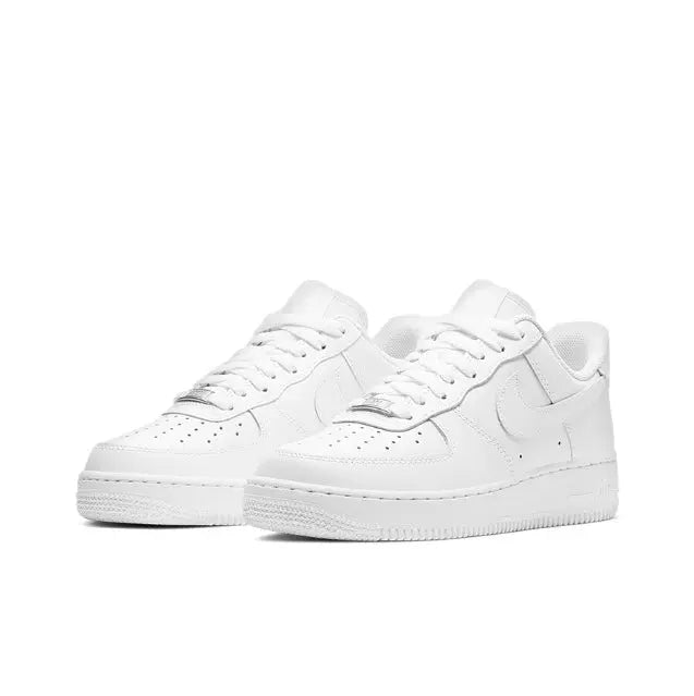 White Nike Air Force 1 low sneakers pair, front view with lace-up and perforations
