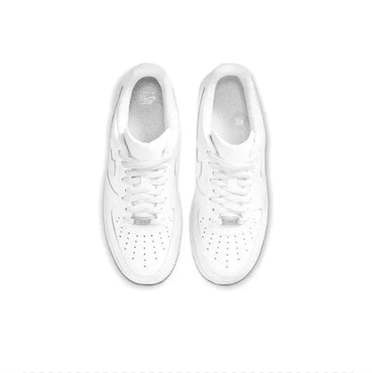 White Nike Air Force 1 low sneakers, top view showing laces and perforated toe box