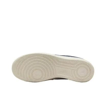 Nike Air Force 1 low-top sneaker outsole with circular traction tread in light beige