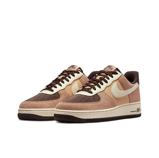 Nike Air Force 1 low-top sneakers pair, tan suede with cream swoosh and brown laces