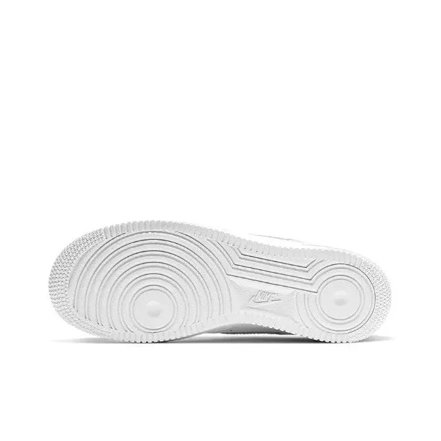 White Nike Air Force 1 low outsole view with circular tread pattern and traction grooves