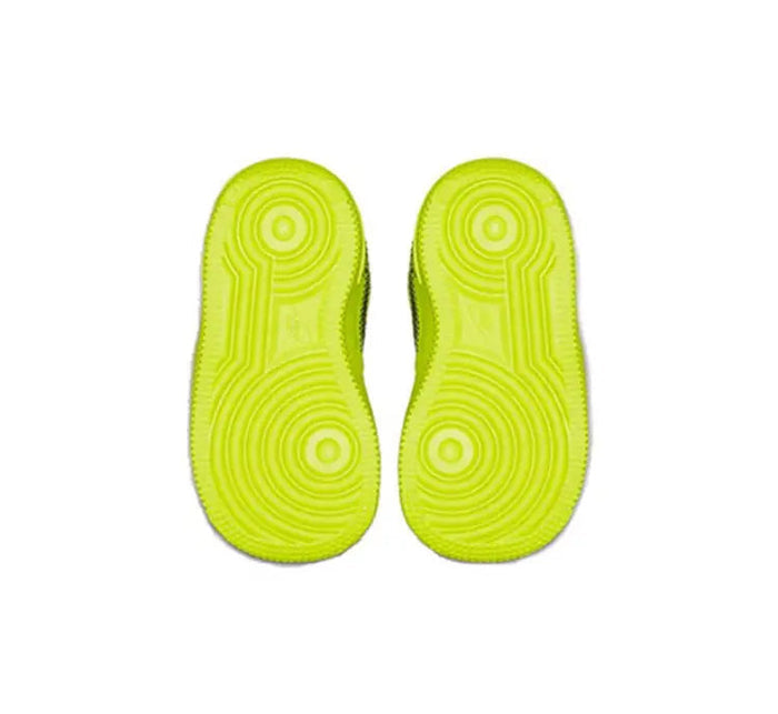 Lime green sneaker outsoles, pair view