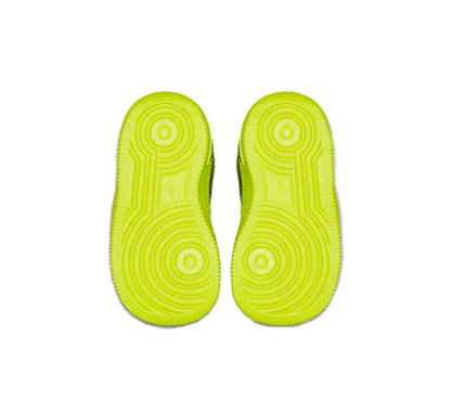 Lime green sneaker outsoles, pair view