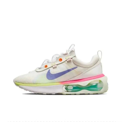 Nike Air Max 2021 running sneaker, white mesh upper, purple swoosh, green air sole
