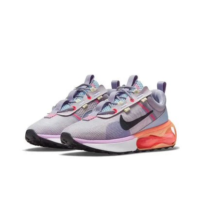 Nike Air Max 2021 sneakers, lavender mesh upper with black Swoosh and orange-red Air unit