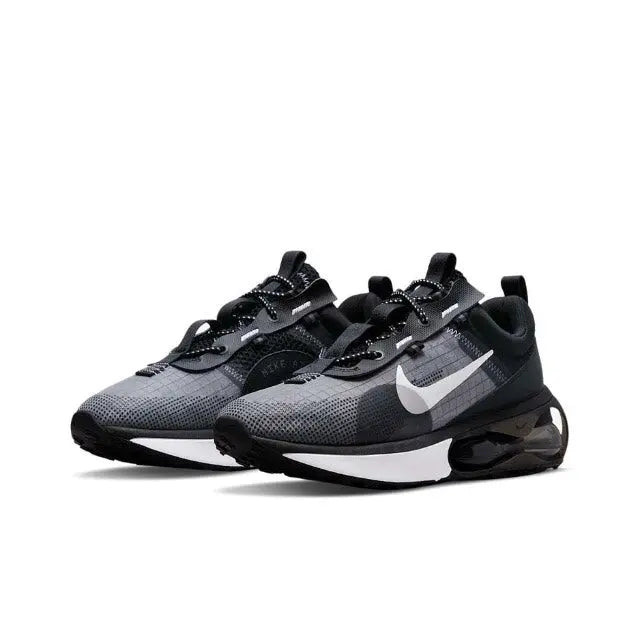 Air Max 2021 sneaker front view, black/grey mesh with Nike swoosh, lace-up