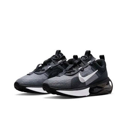 Air Max 2021 sneaker front view, black/grey mesh with Nike swoosh, lace-up