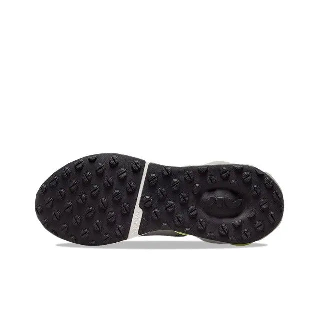 Nike running sneaker outsole, dark tread with raised rubber pods