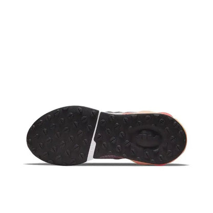 Nike Air Max 2021 outsole view with black tread and orange-red Air unit detail