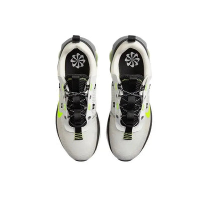 Nike running sneaker, off-white heel with black lining and neon-green stripe details
