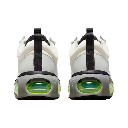 Nike running sneaker heel view, translucent green air window with black midsole