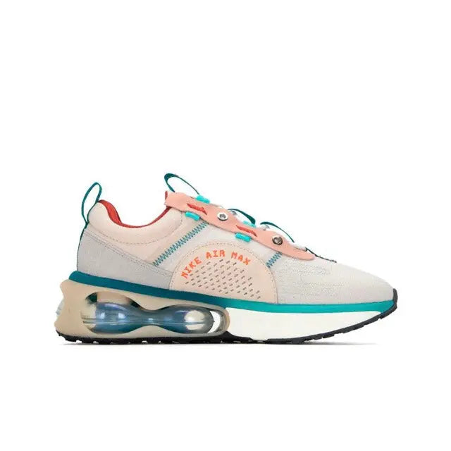 Light sneakers with AIR MAX heel text, orange swoosh, teal details, Air window