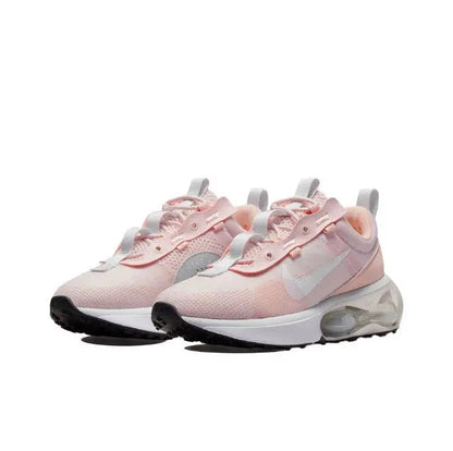 Nike Air Max 2021 pair of light pink sneakers with grey Swoosh and Air window
