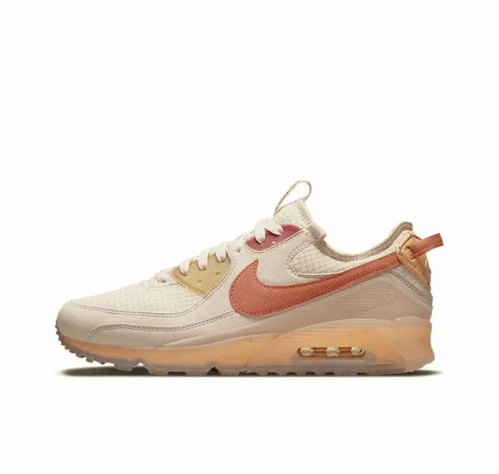 Nike Air Max 90 sneaker, light tan with orange Swoosh and clear air sole