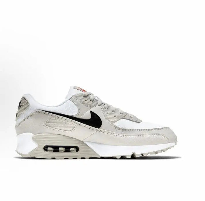 Nike Air Max 90 sneakers, white and beige with black swoosh and visible air unit