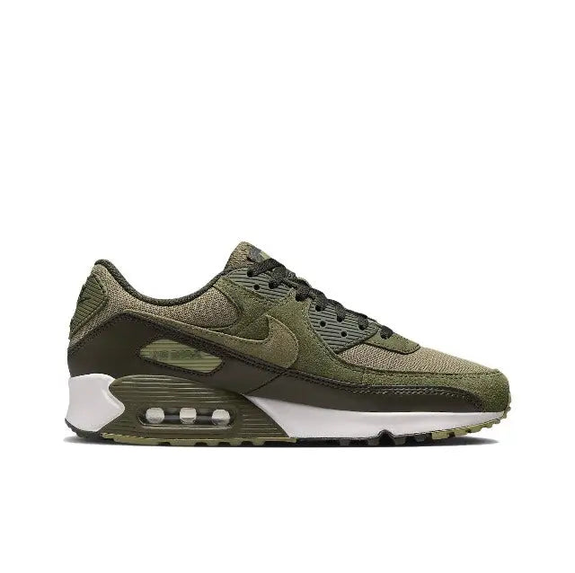 Nike Air Max 90 sneakers in olive green, black, and white with visible air unit