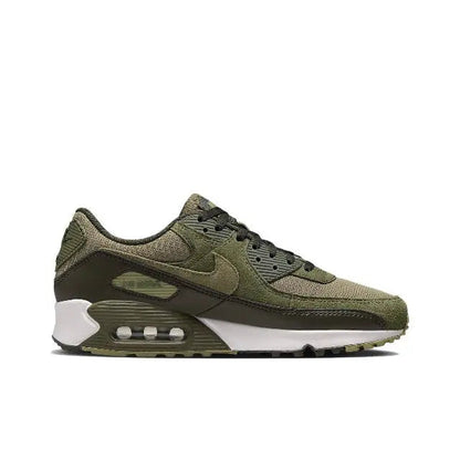 Nike Air Max 90 sneakers in olive green, black, and white with visible air unit