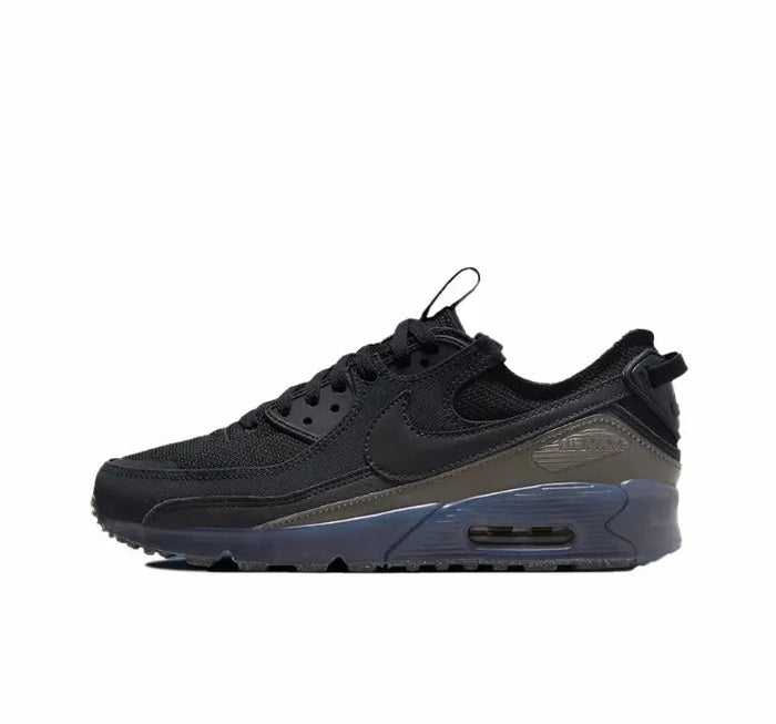 Nike Air Max 90 sneakers in black with gray overlays and blue visible Air unit