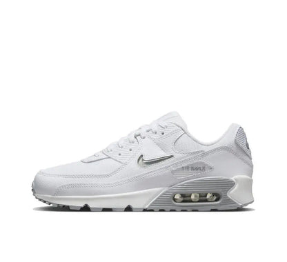 Nike Air Max 90 sneaker in white/grey, front side view with Air window