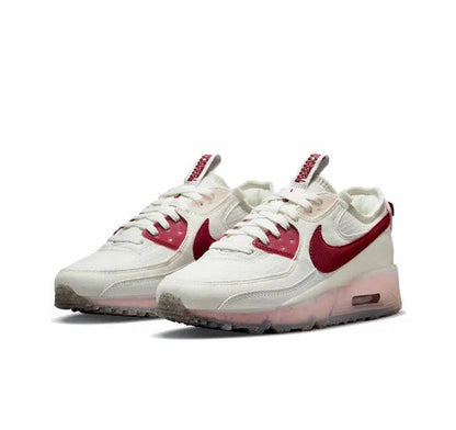 Nike Air Max 90 sneakers in white with burgundy swoosh and pink-tinted outsole