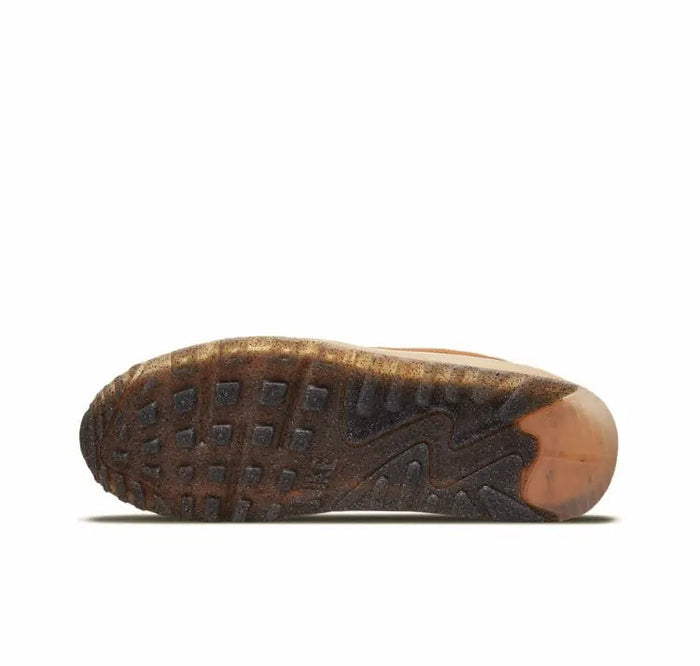 Air Max 90 sneaker outsole with dark tread and tan rubber edge