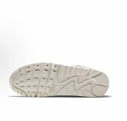 Nike Air Max 90 sneakers, white outsole with traction tread and Air logo