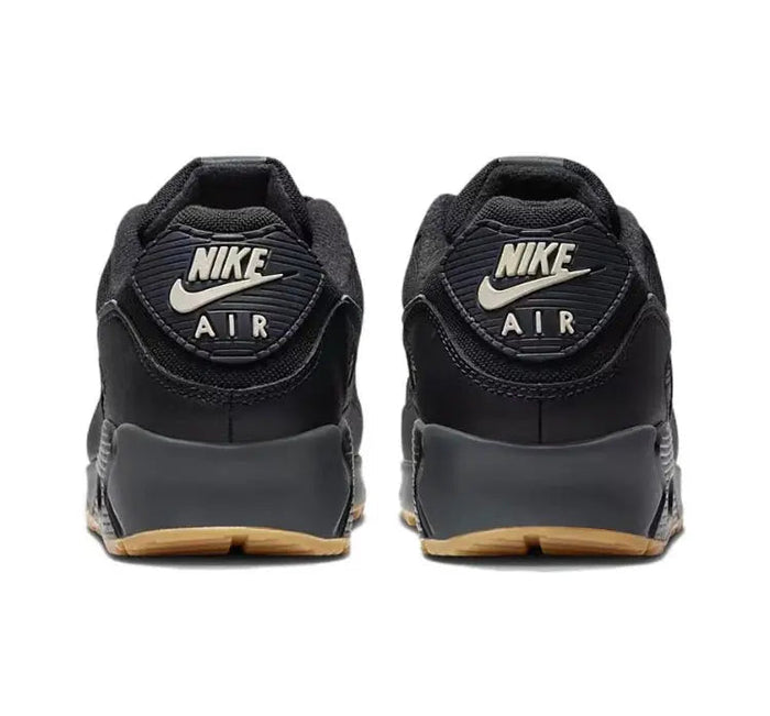 Nike Air Max 90 sneakers with Nike Air heel logo and black-and-tan sole