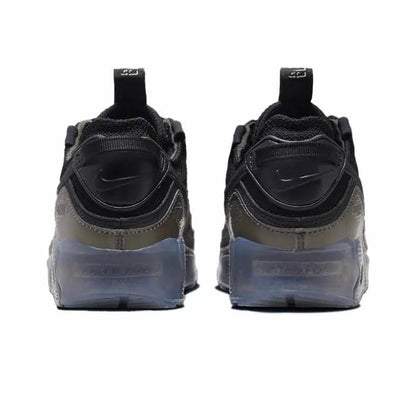 Nike Air Max 90 heel view in black with gray paneling and blue translucent midsole