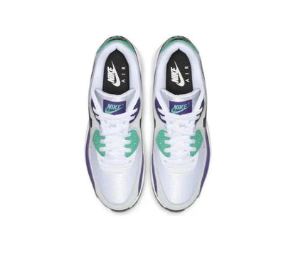 Pair of white low-top sneakers with teal accents, purple collar, and Nike Air text