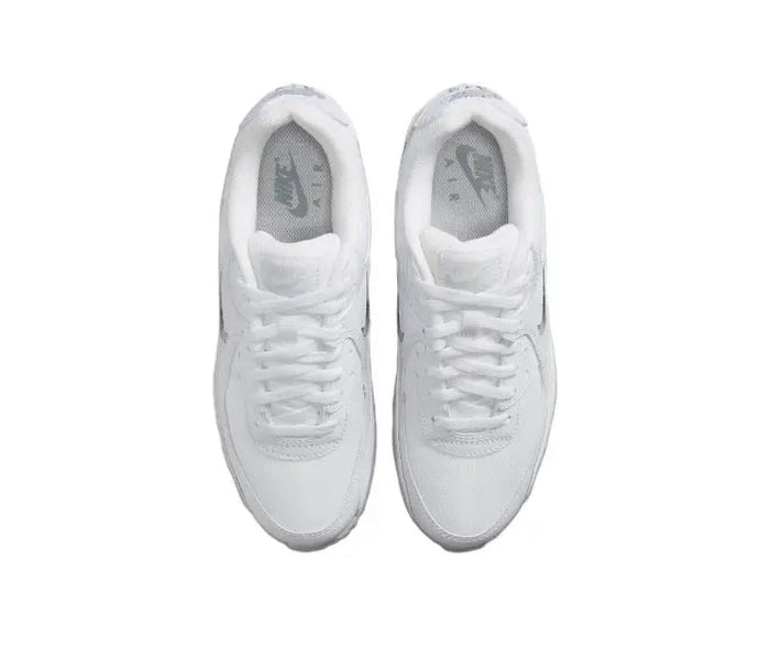 Nike Air Max 90 sneaker pair top view in white with lace eyelets