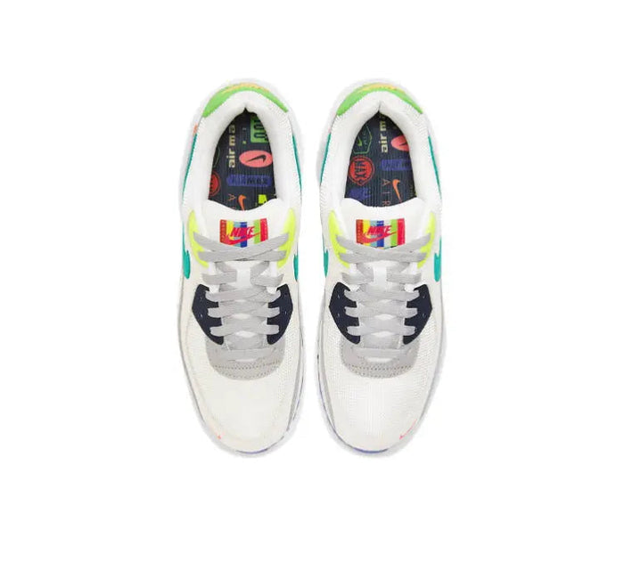 Air Max 90 sneakers, white uppers with navy laces and multicolor tongue logo