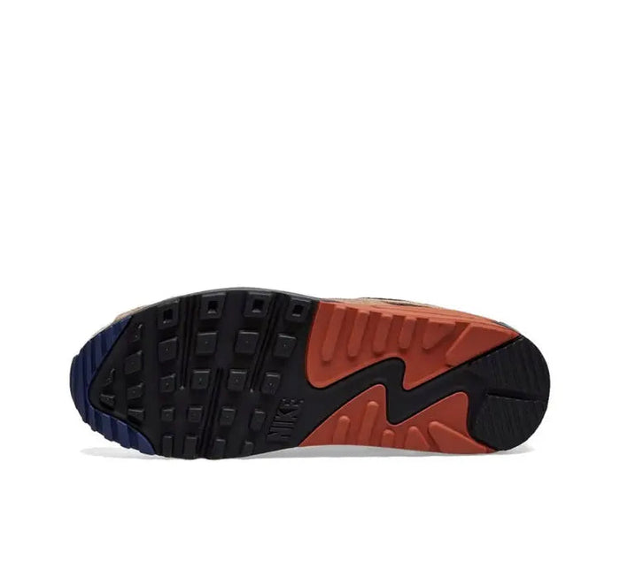 Nike Air Max 90 outsole with dark tread and orange heel section