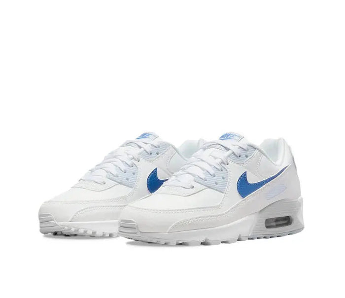 Pair of white sneakers with blue swooshes and Air cushioning sole