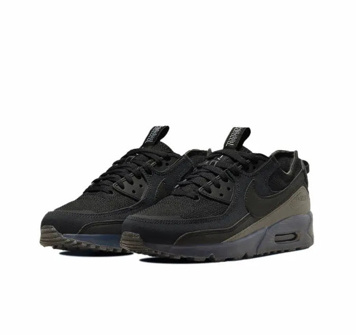Nike Air Max 90 sneakers in black with olive-gray accents and blue Air unit